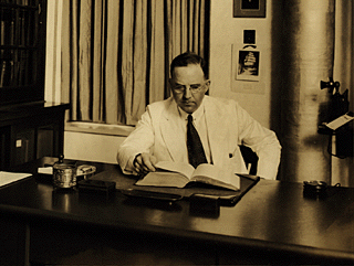 [Dr. Faust in his private office, Hutchinson Memorial, 1932.]