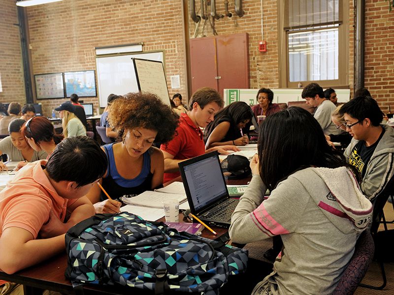 Groups of students working in classroom