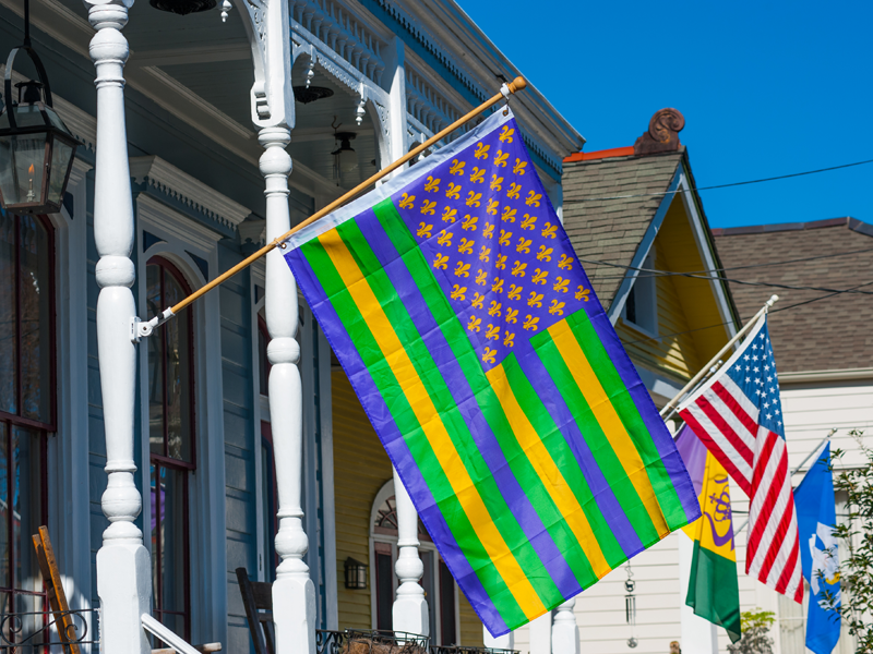Colorful flags hang on New Orleans homes Colorful flags hang on New Orleans homes